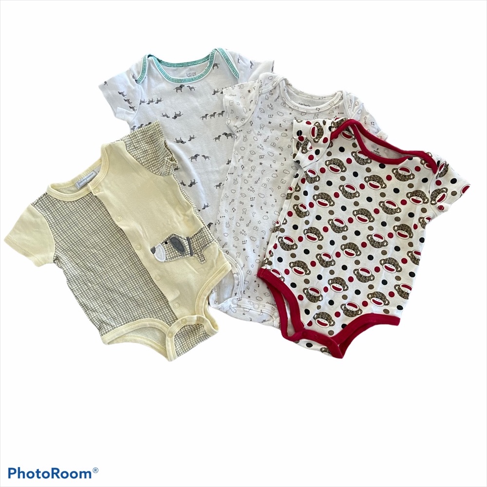 First impressions + other onesies | 6-9 months